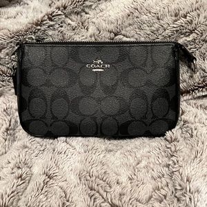 Coach black signature NoliTa 19